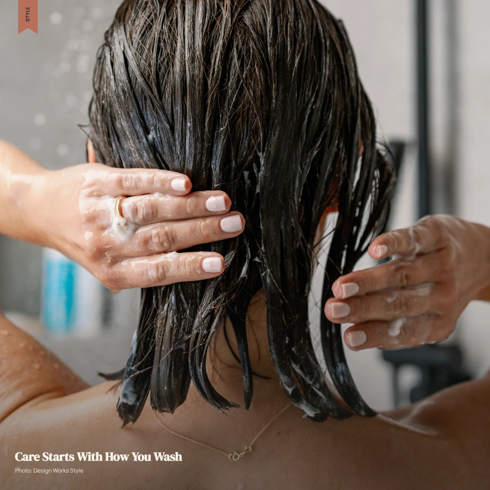 Balayage hair being gently conditioned through the lighter mid-lengths and ends