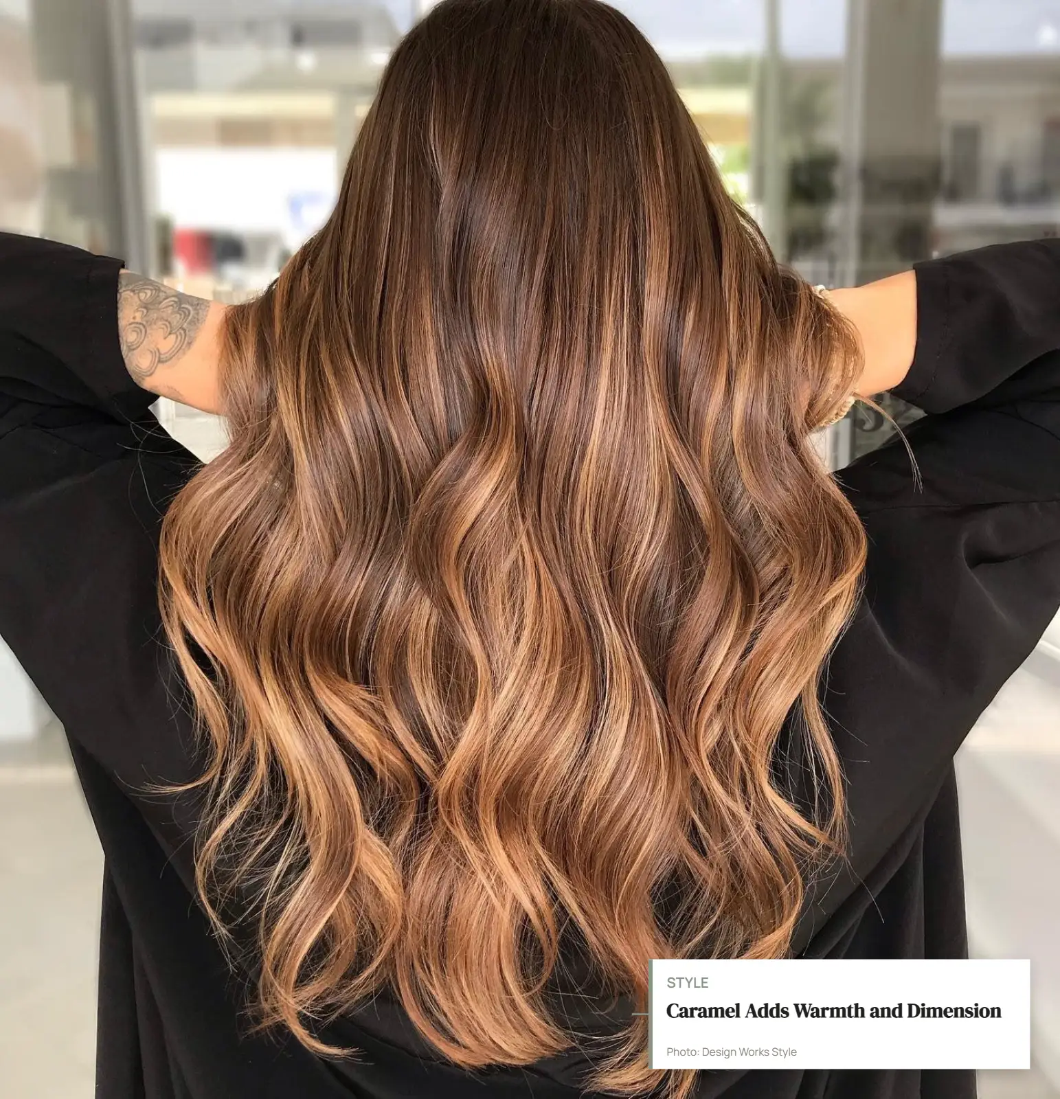 Warm caramel balayage ribbons blended through softly waved brown hair