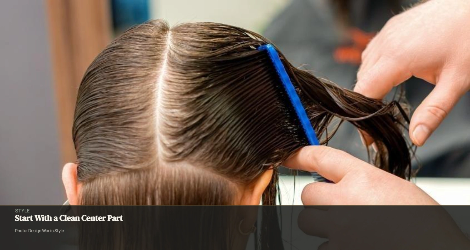 Hair divided with a clean center part using a tail comb before highlight sectioning