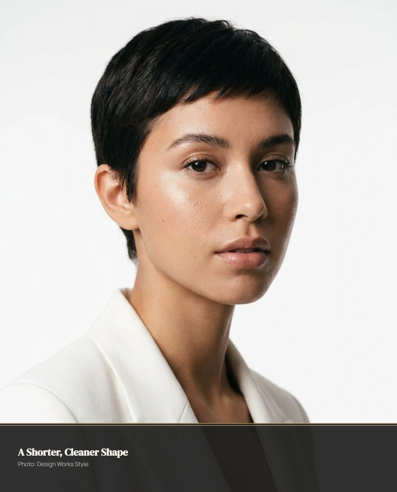 Short pixie with a clean defined silhouette and realistic natural hair texture
