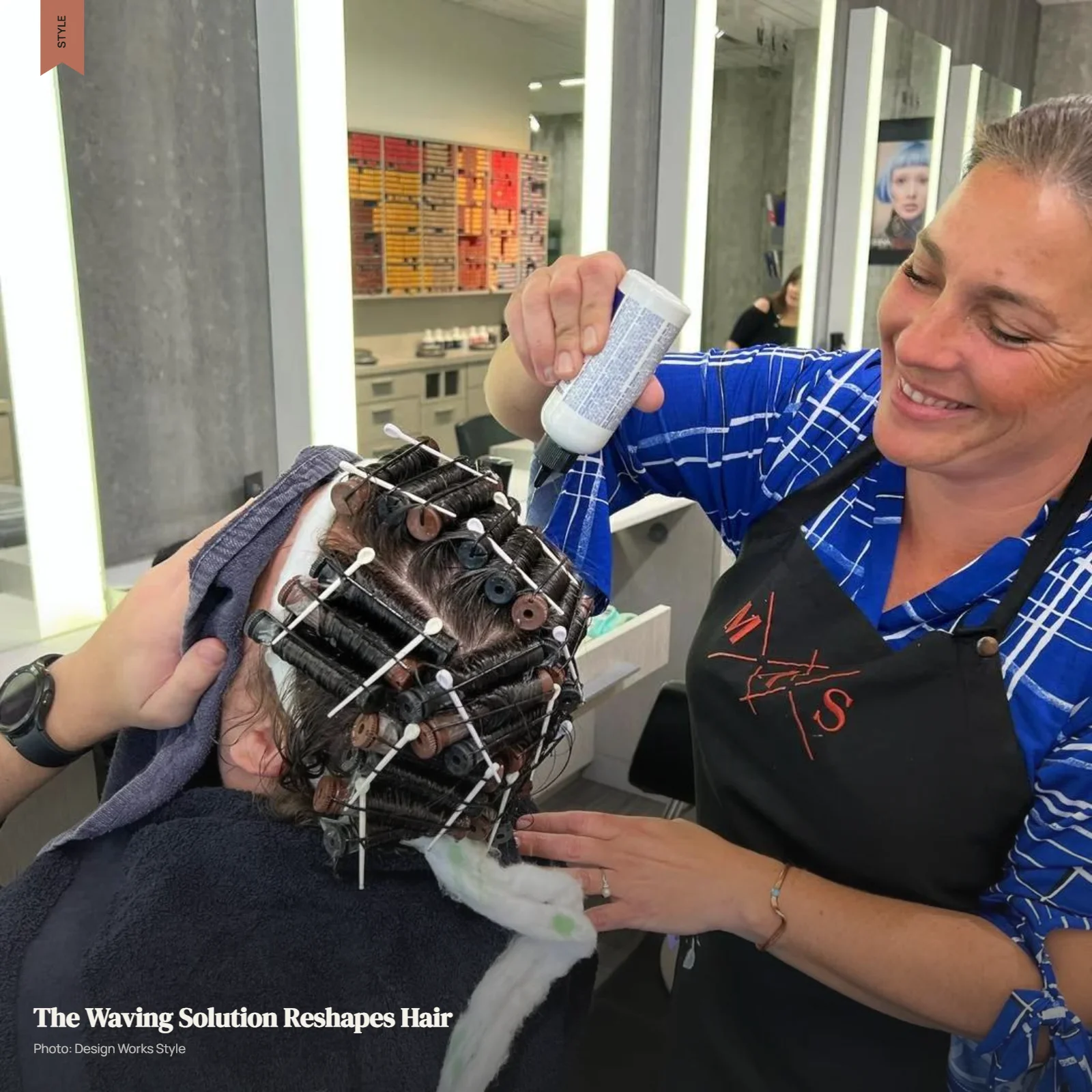 Stylist applying waving solution to hair wrapped around perm rods