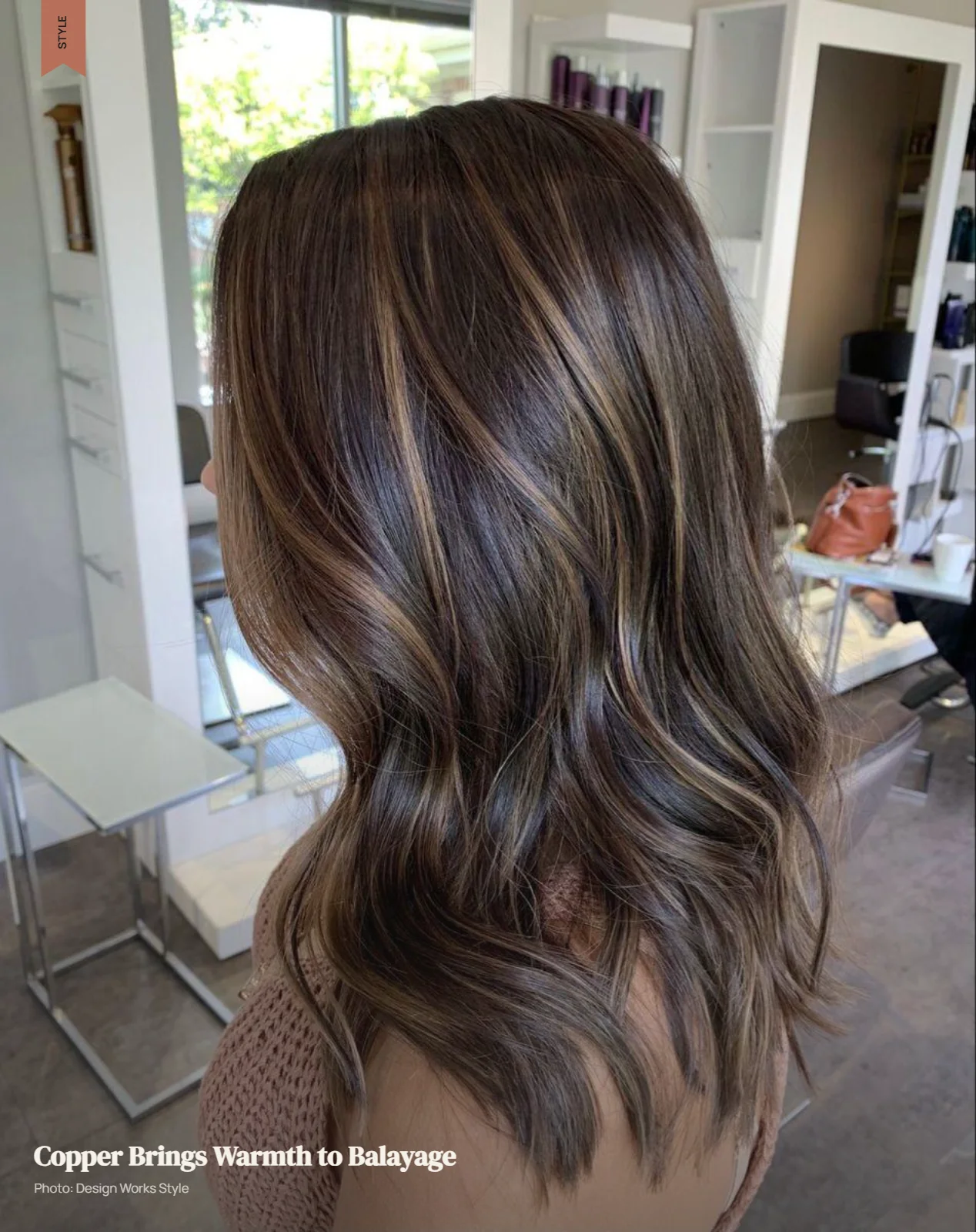 Copper balayage with warm copper pieces blended through wavy brown hair
