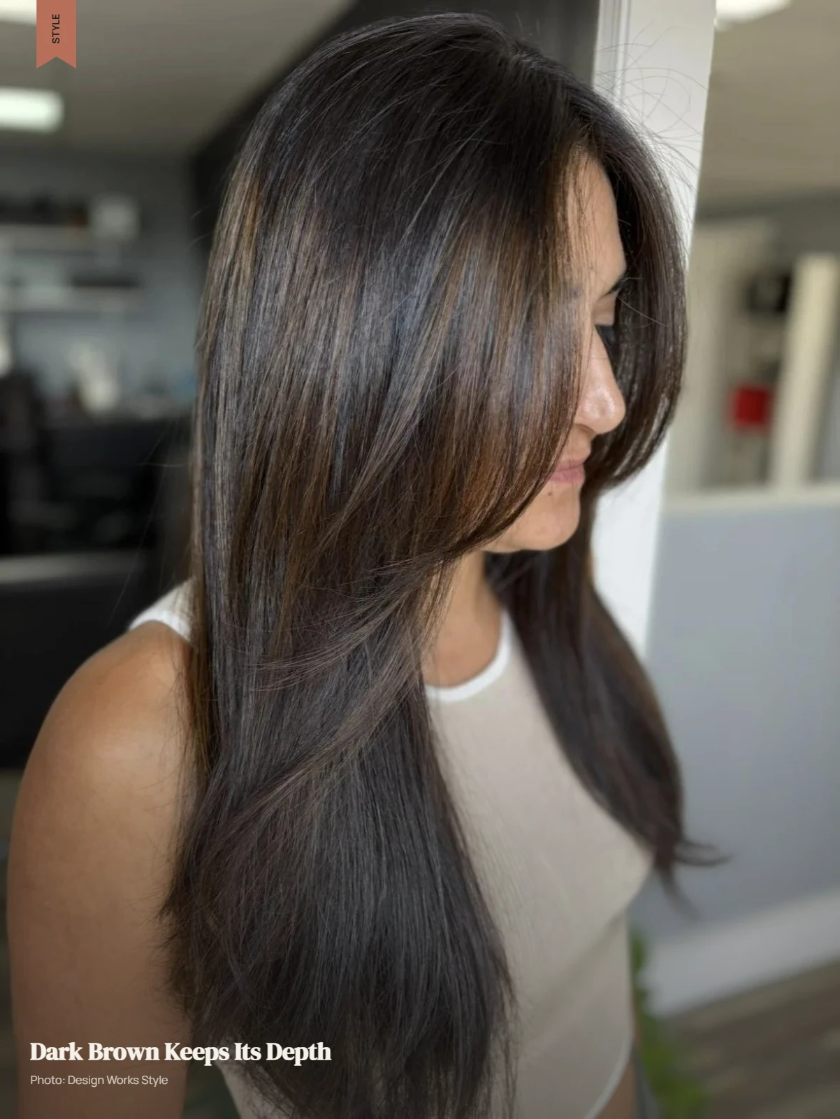 Dark brown hair with subtle caramel warmth while retaining a deep brunette base