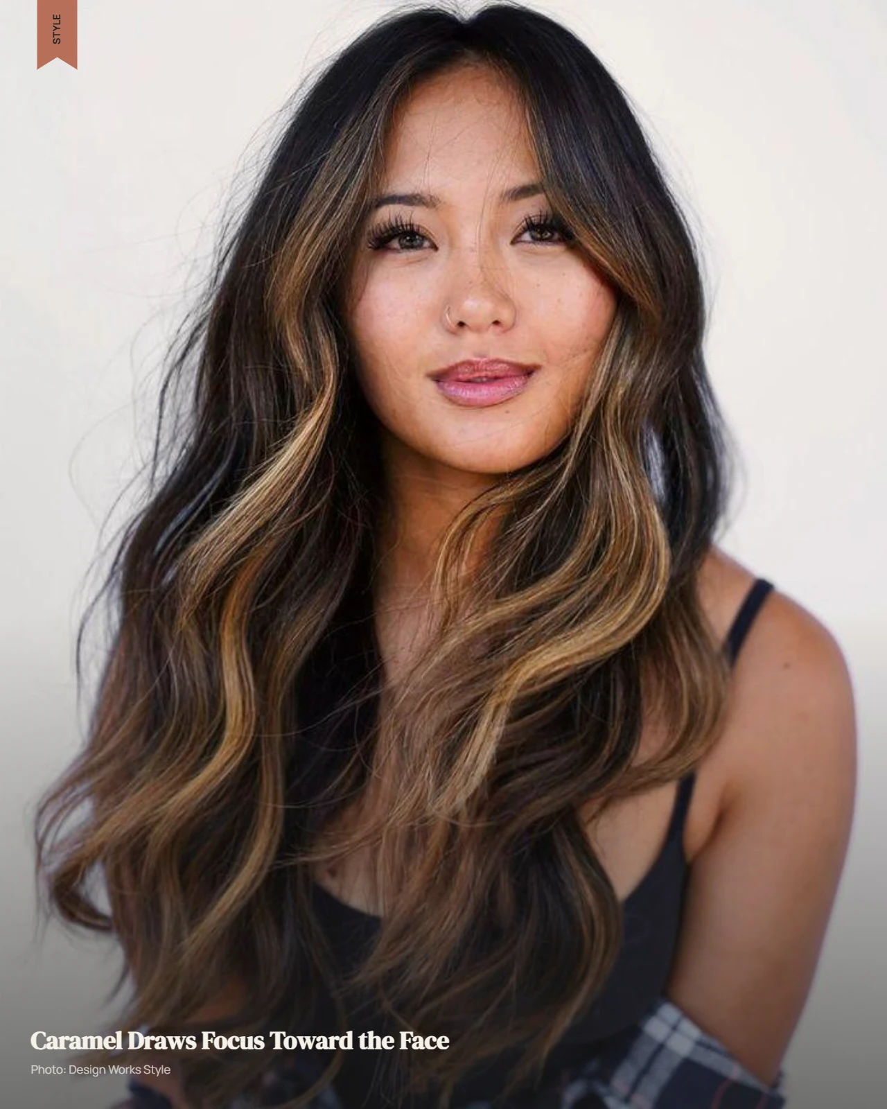 Deep brown hair with brighter caramel balayage concentrated around the face