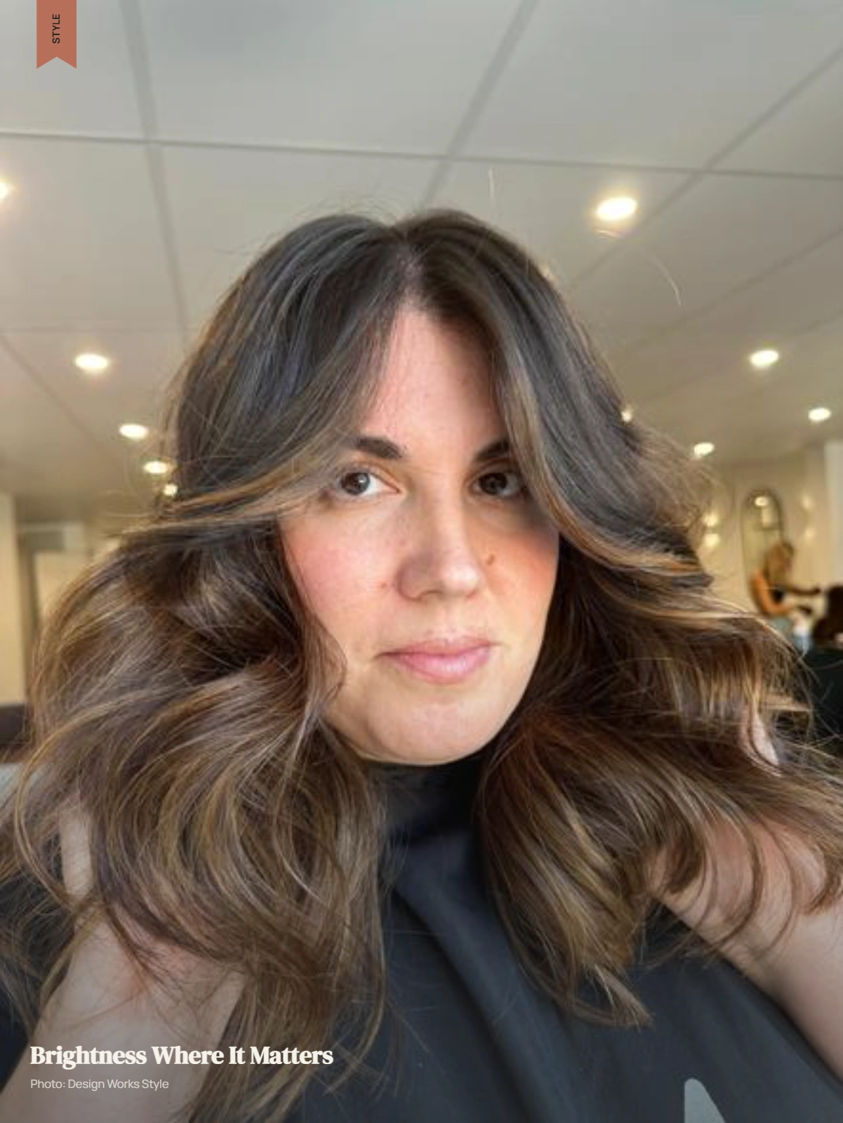 Brunette hair with fine face-framing highlights blended softly into a darker base