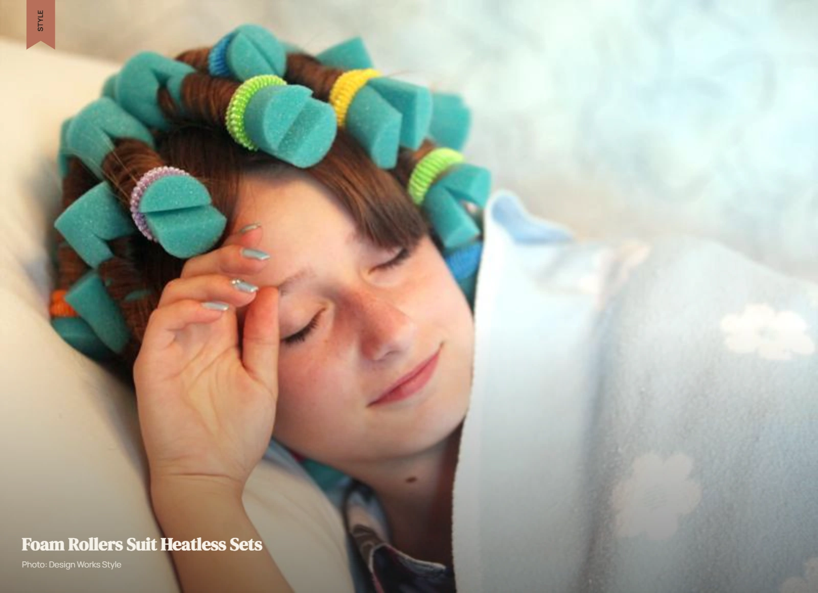 Woman wearing soft foam rollers for overnight heatless curl styling