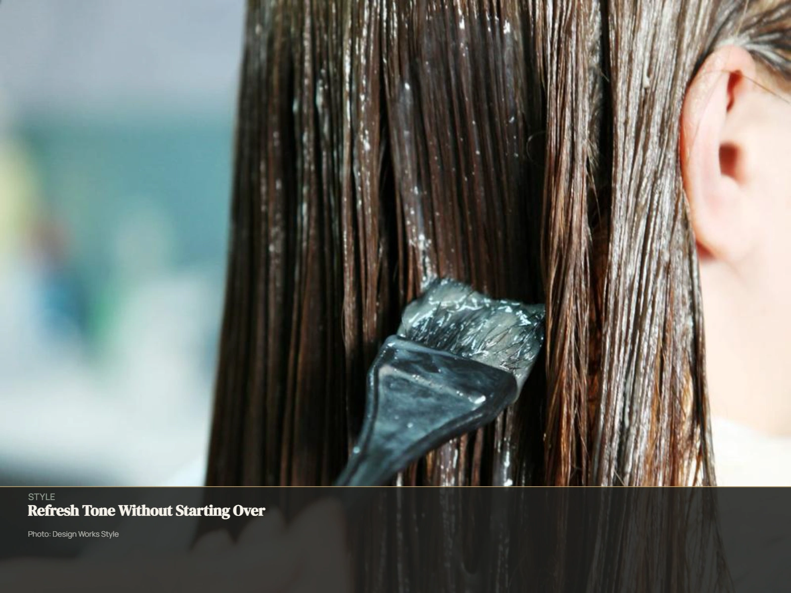 Stylist applying a gloss treatment to brunette hair for a tonal refresh