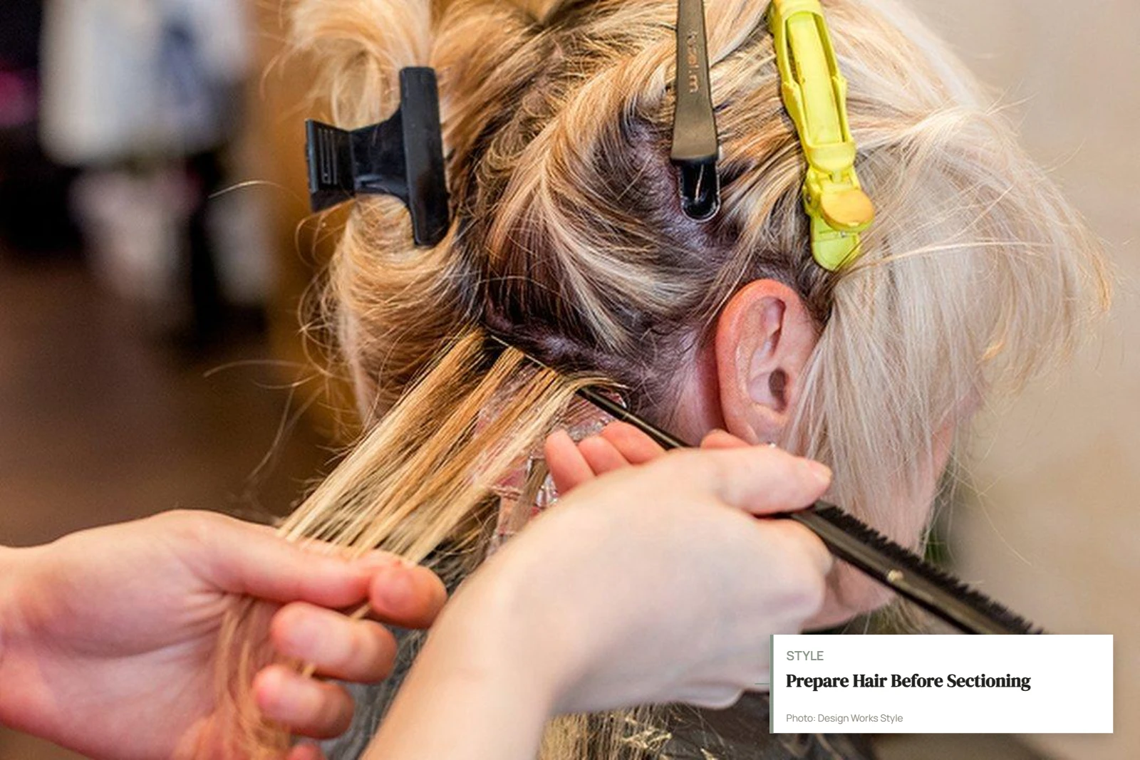 Hair prepared with a clean part, sectioning clips, and tail comb before highlighting
