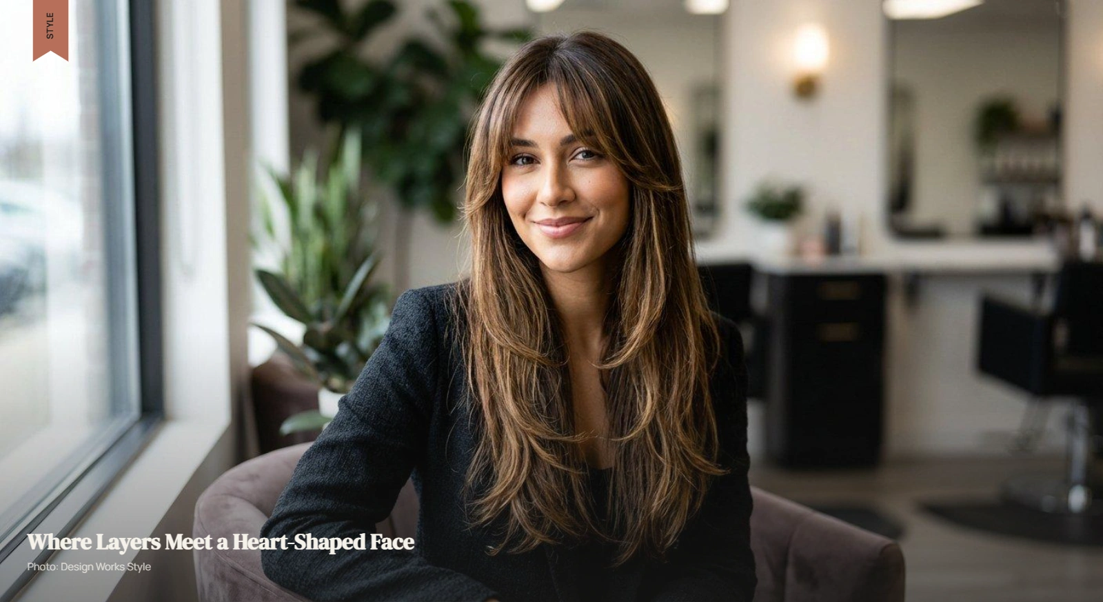 Long layered haircut with face-framing pieces extending toward the jaw on a heart-shaped face