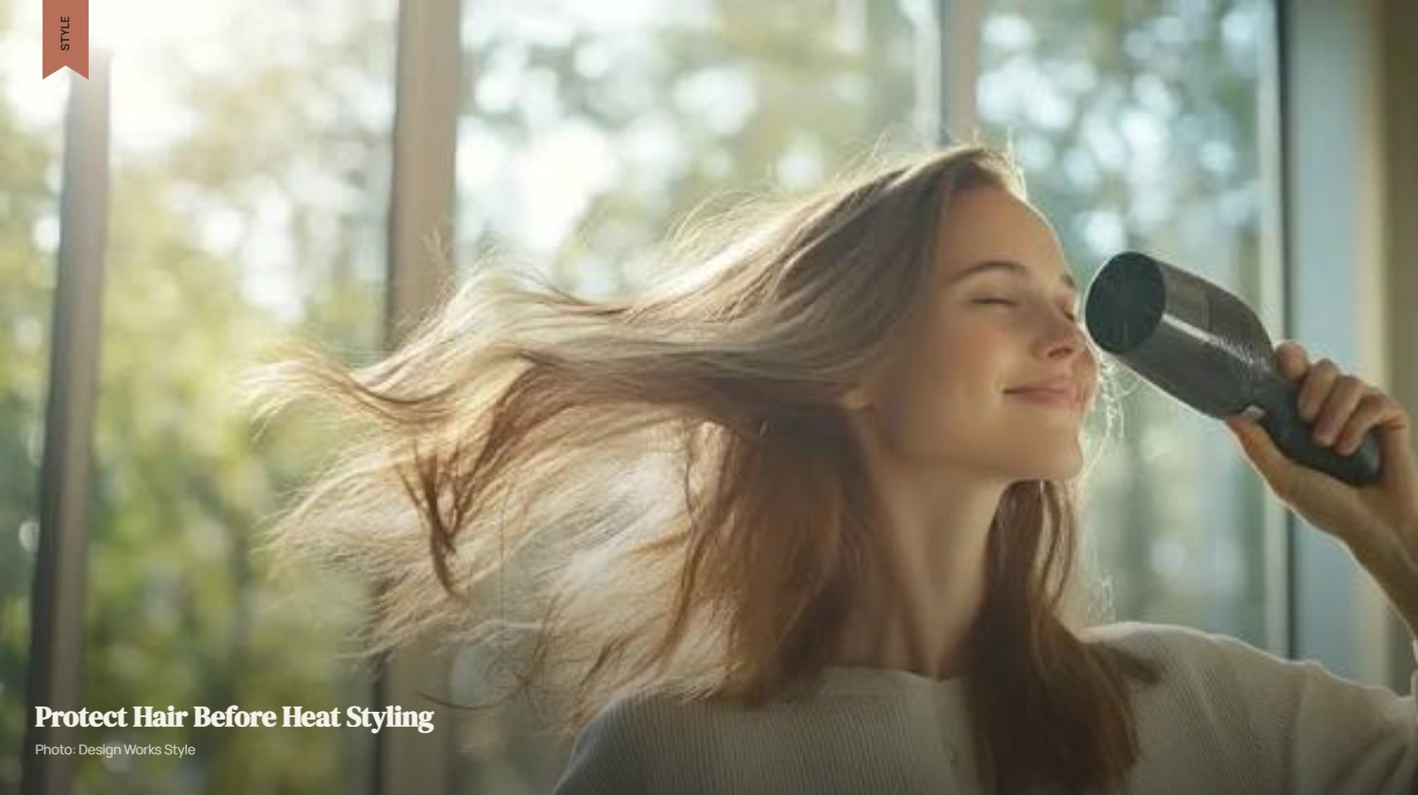 Woman applying heat protectant spray through her hair before using a styling tool
