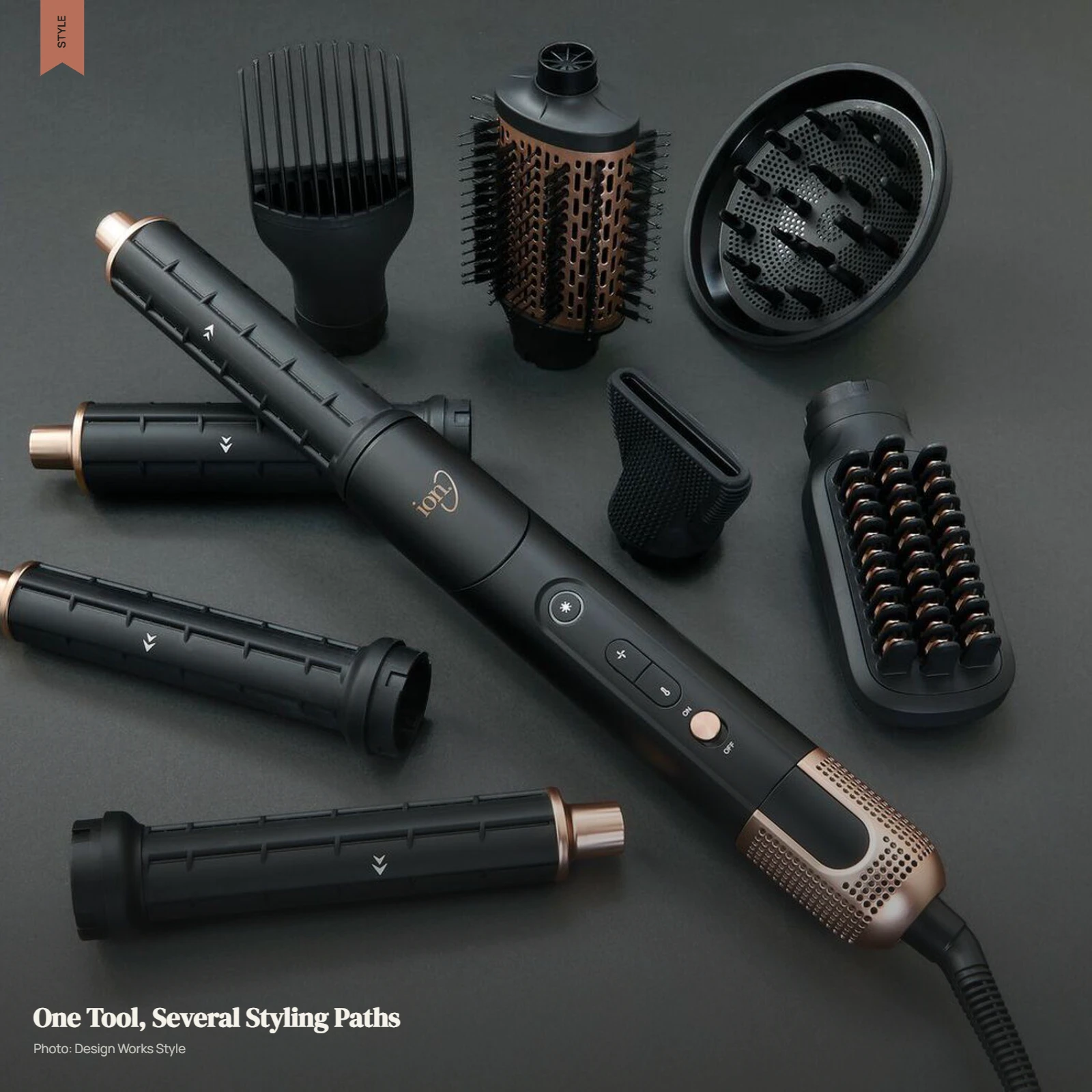Hot-air brush styling hair with multiple multi-styler attachments visible