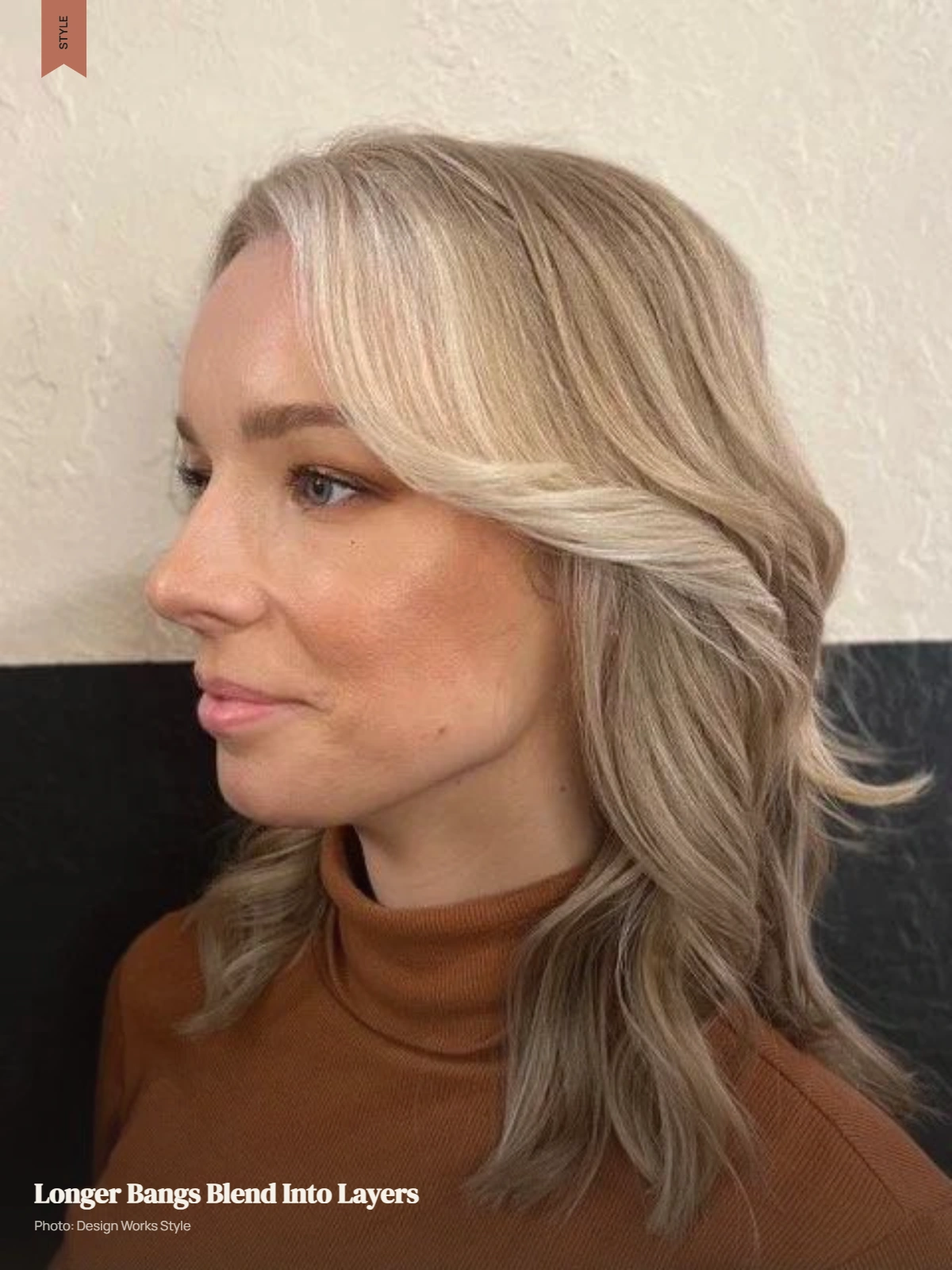 Long blended bangs transitioning into the surrounding haircut