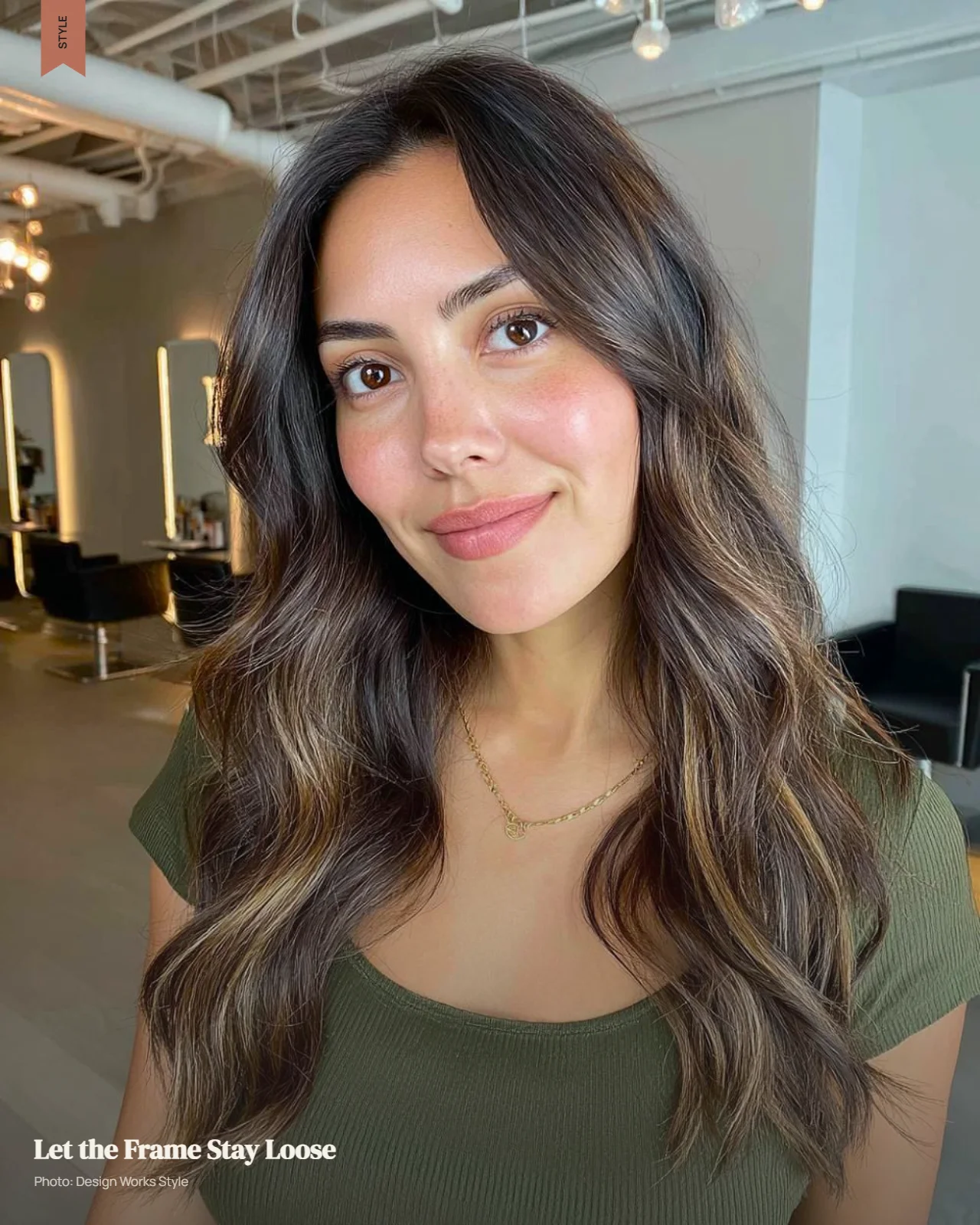 Loose face-framing pieces styled around the cheeks and jaw