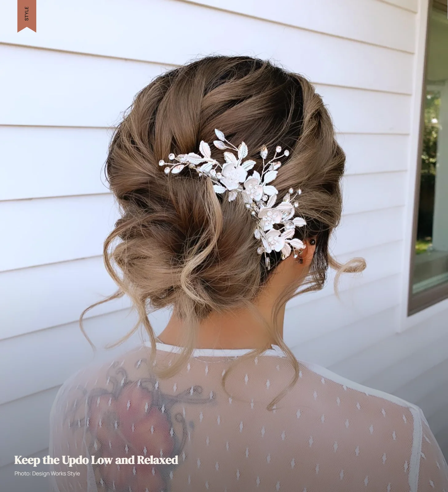 Loose low updo with natural texture and face-framing pieces