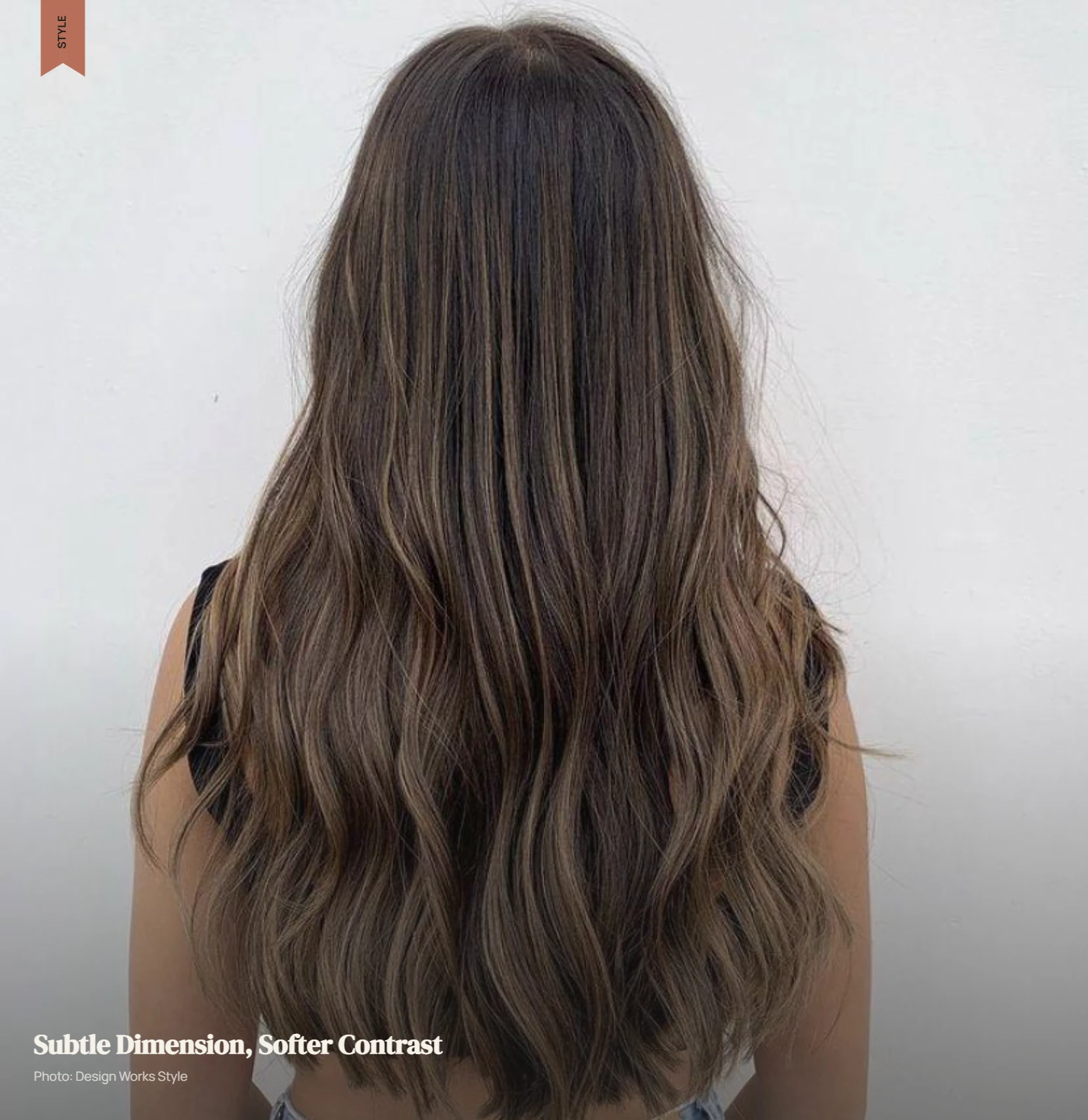 Brunette hair with subtle lighter brown pieces and low-contrast dimension