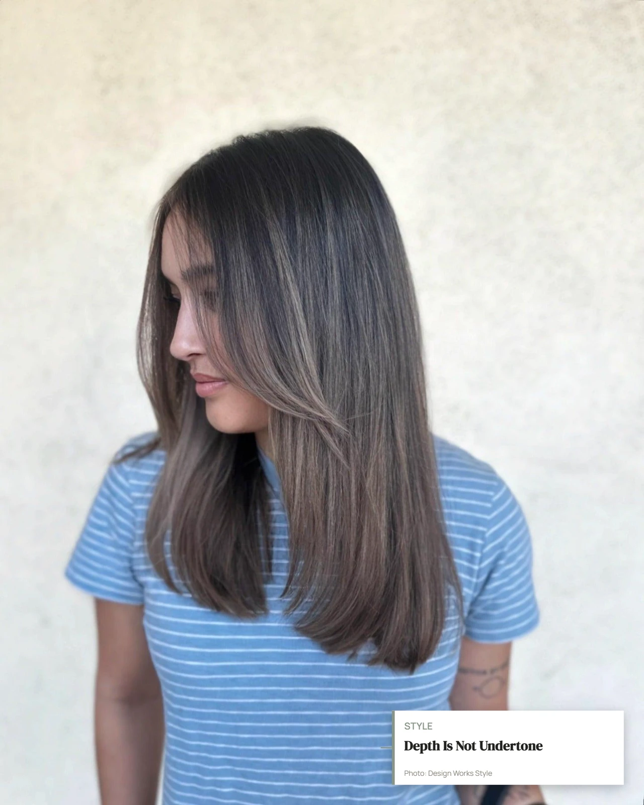 Medium ash brown hair with cool muted brown tones and minimal golden warmth