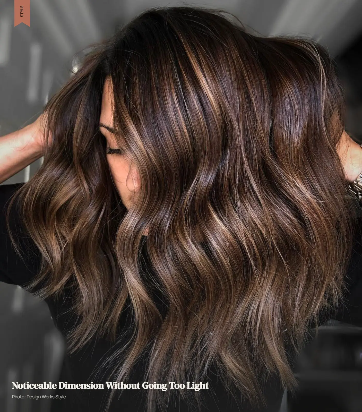Brunette hair with clearly visible lighter pieces and medium contrast