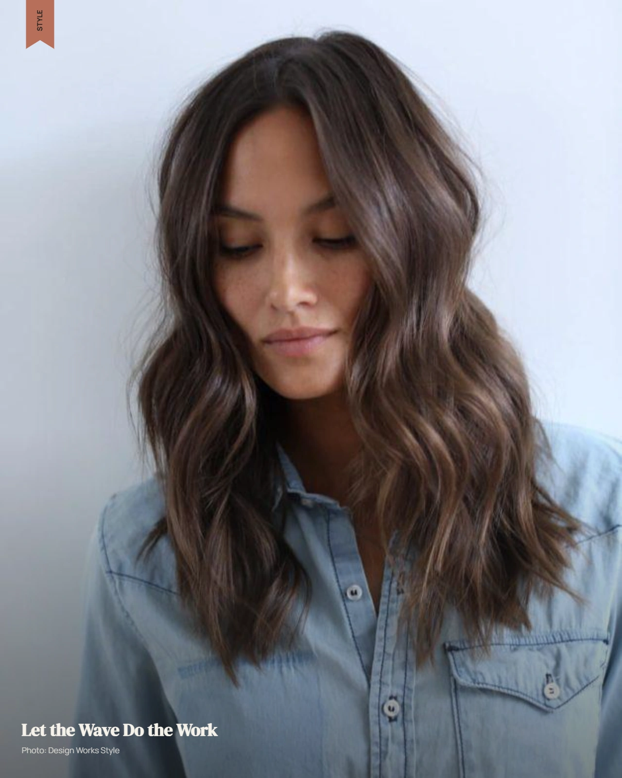 Naturally wavy hair worn loose with soft movement and relaxed texture