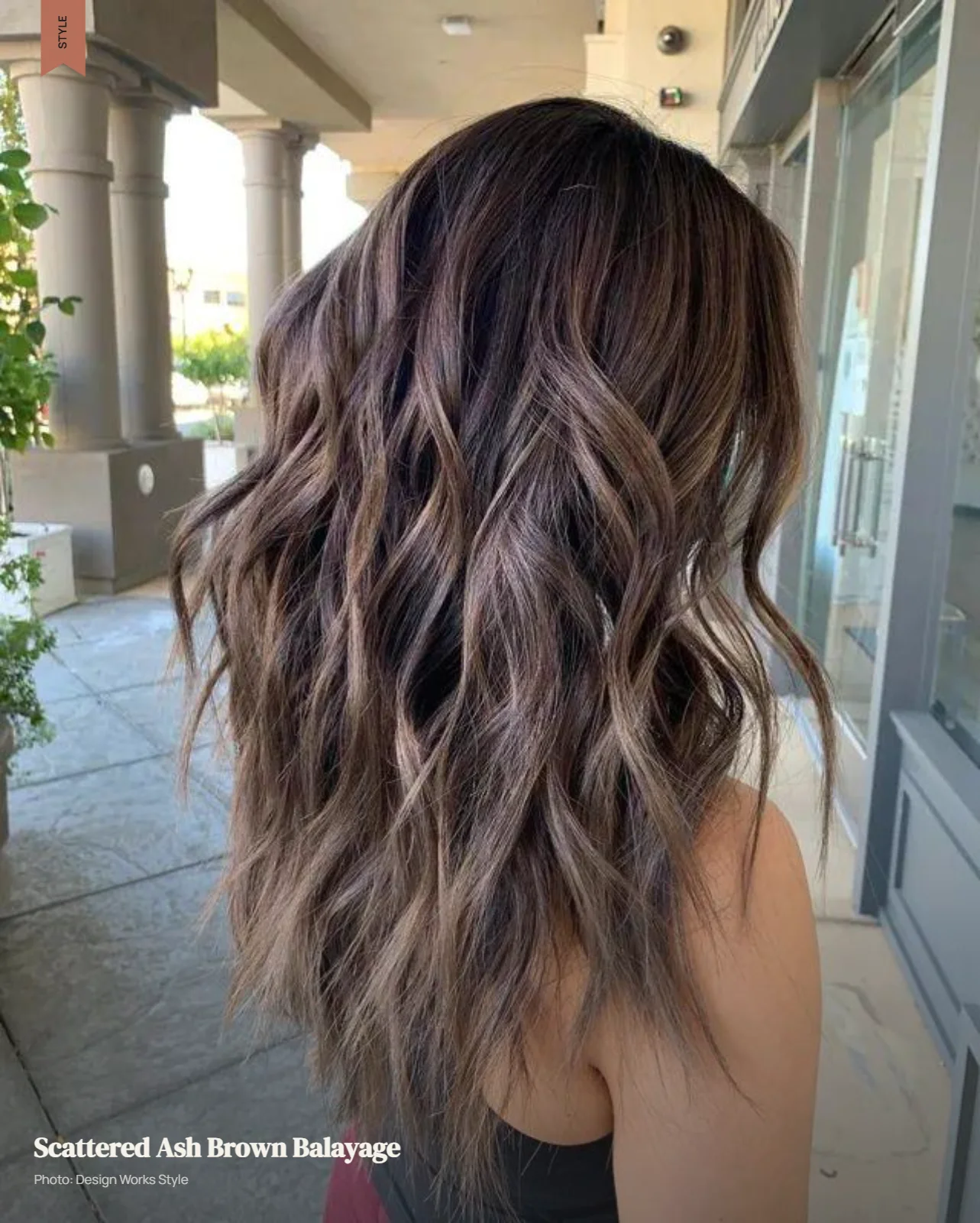 Scattered ash brown balayage pieces creating dimension through dark brunette hair