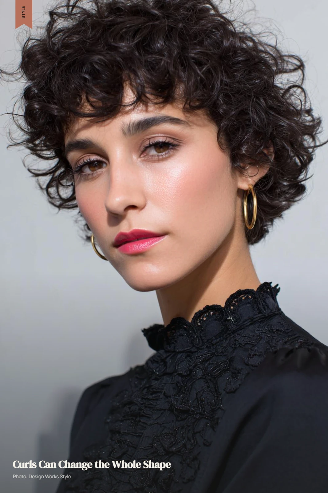 Short curly haircut with defined natural curls and a clearly visible silhouette