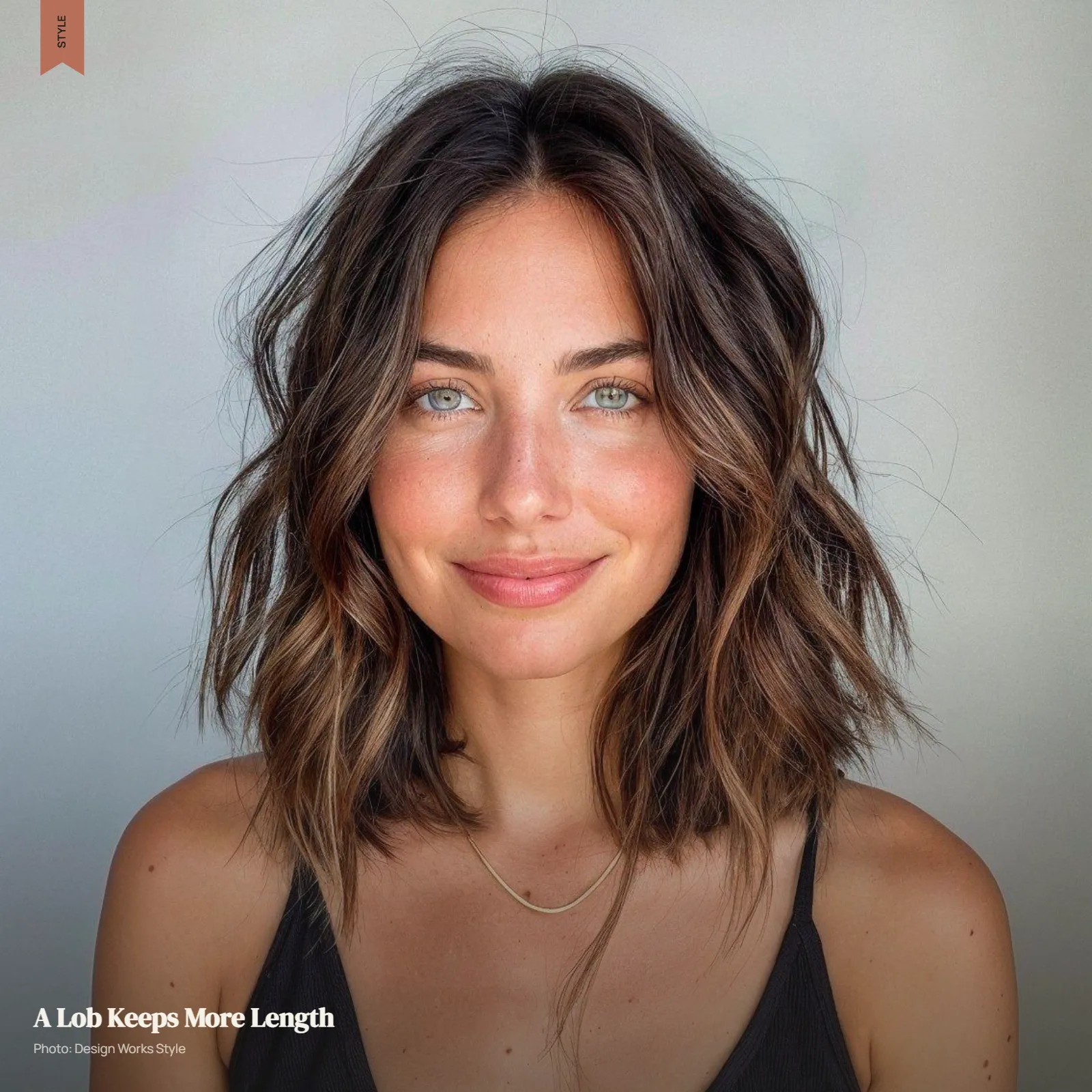Shoulder-grazing textured lob with loose waves and natural movement