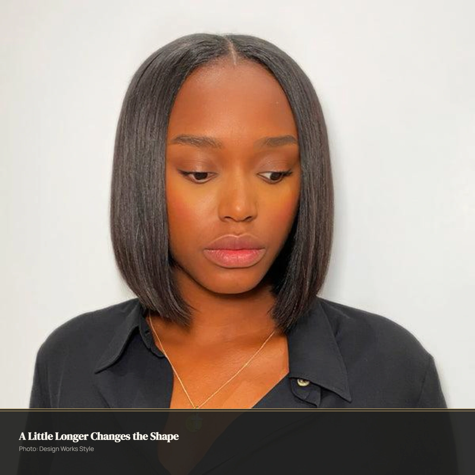 Sleek longer bob with straight hair texture and a clean outline below the chin