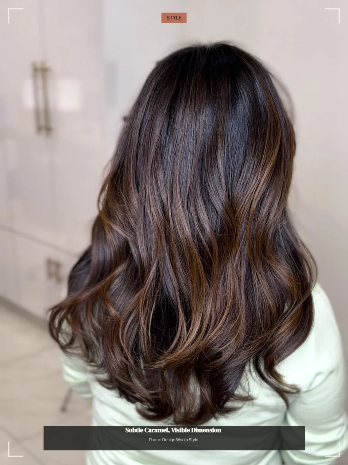 Dark brown hair with subtle caramel pieces creating soft dimensional variation