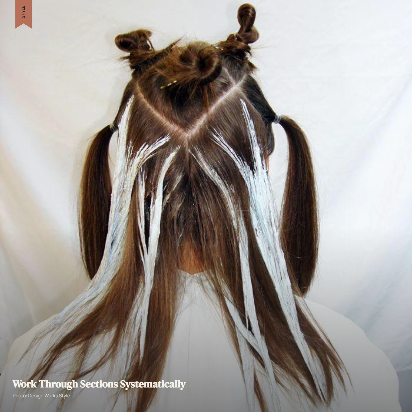 Hair divided into organized sections with clips for a systematic highlighting sequence