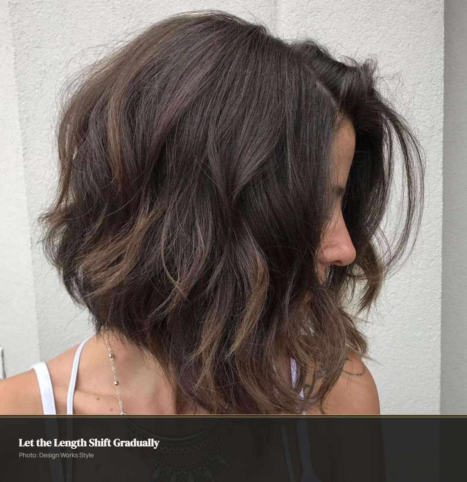 Textured angled bob with a subtly longer front shown from a three-quarter view