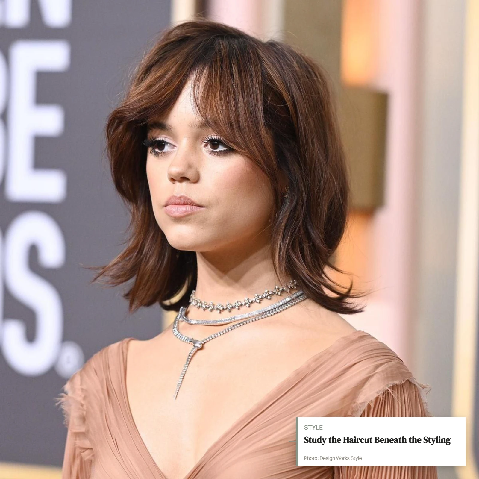 Three-quarter view of a textured bob with layered movement and a visible fringe