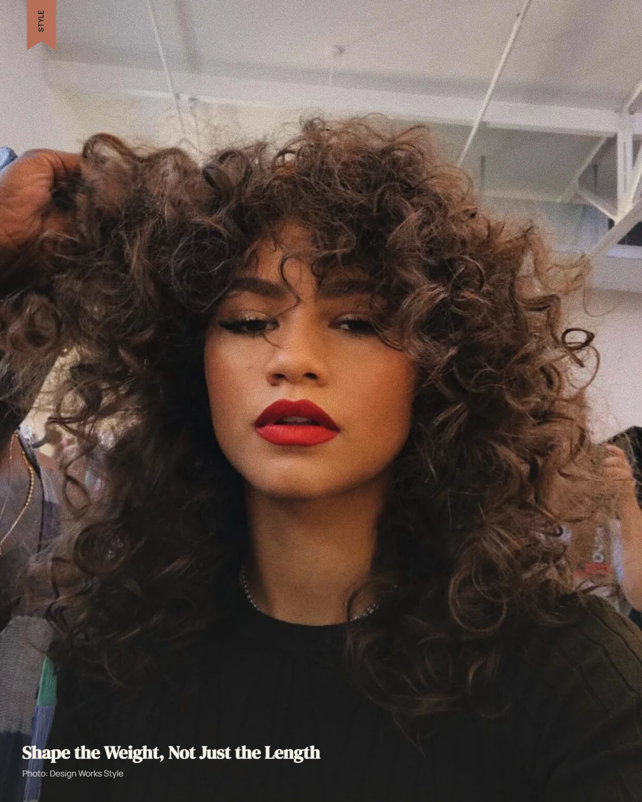 Thick short hair shaped with controlled volume, layered weight distribution, and a defined silhouette