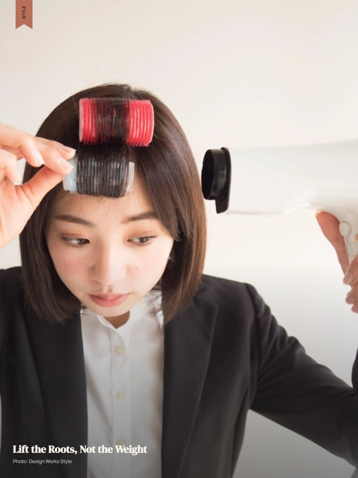 Small roller lifting the roots of fine hair bangs for controlled volume