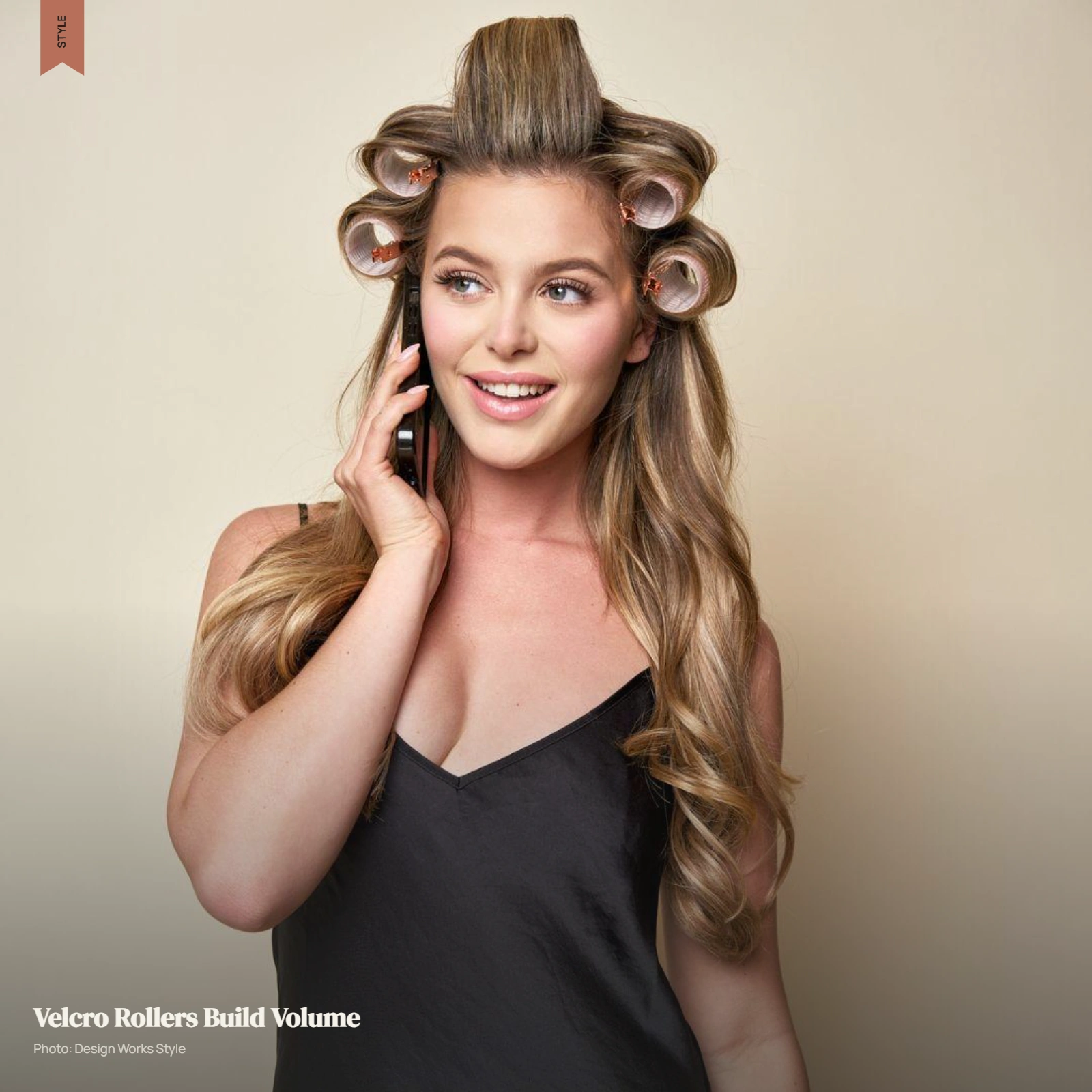 Large Velcro rollers set through the crown and sides of hair for volume