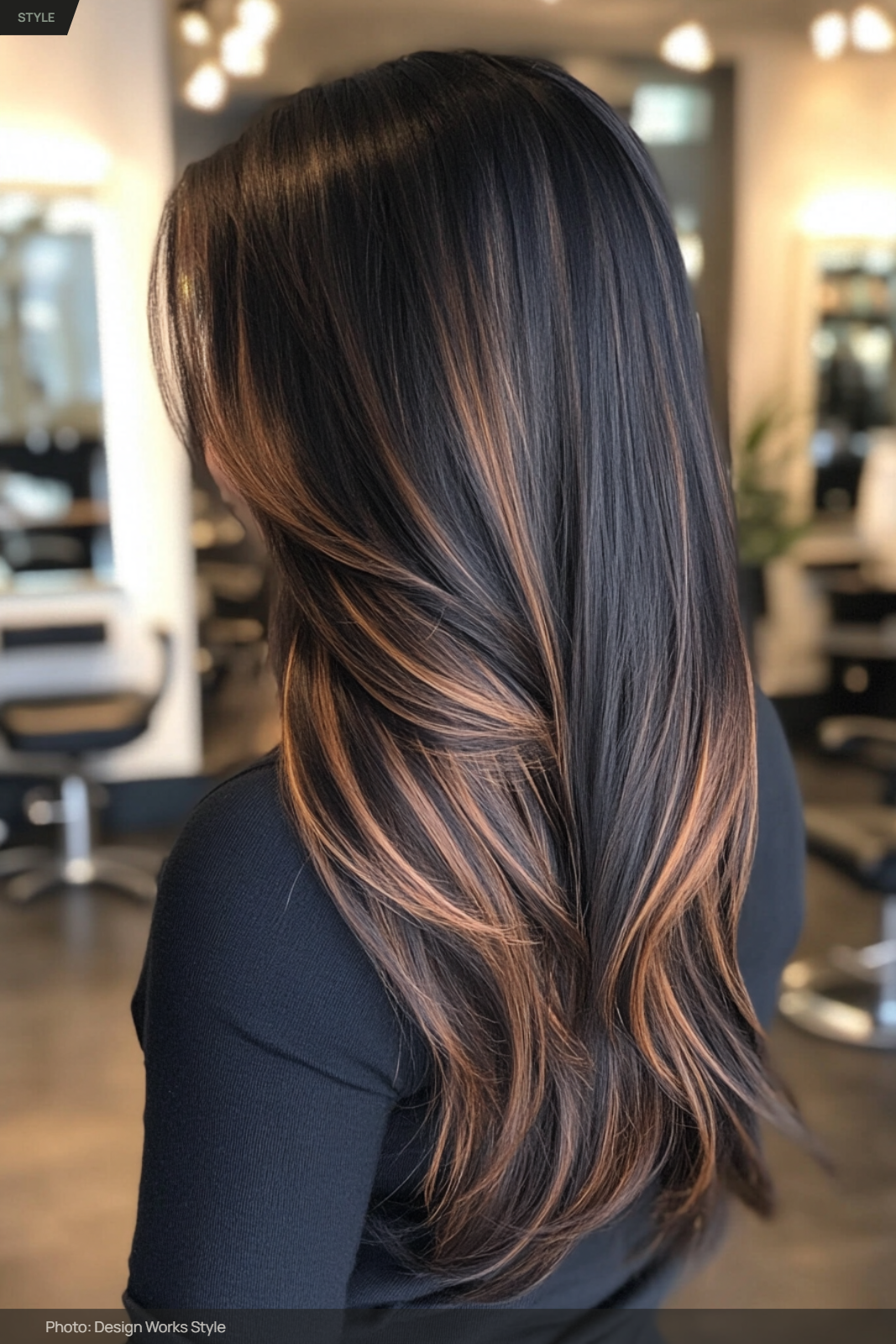 Very dark brown hair with noticeably lighter caramel balayage through the lengths