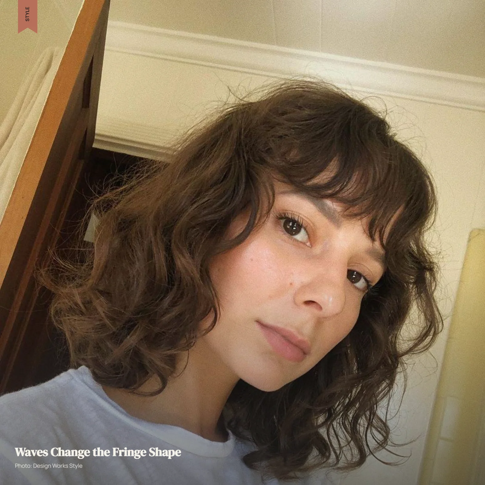Wavy hair with lightweight bangs following the hair’s natural bend