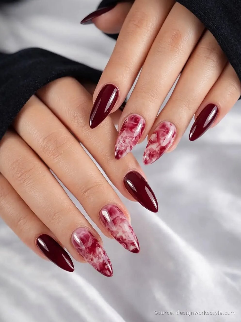 Burgundy fall nails with pink marble accent nails