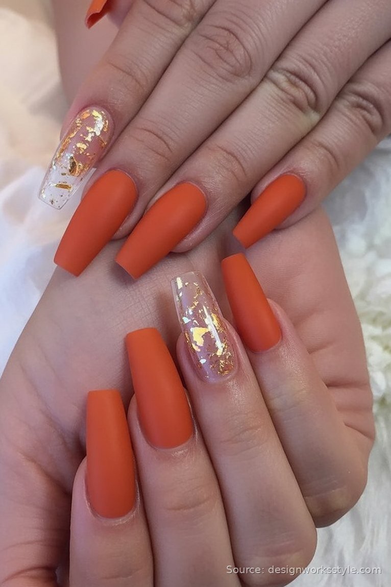 Matte burnt orange coffin nails with clear gold foil accent nails