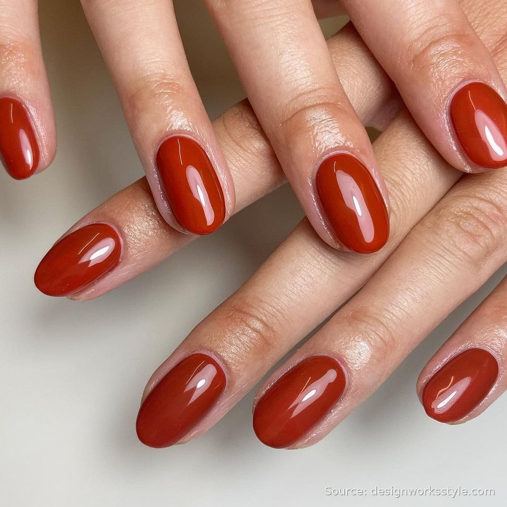 Glossy burnt orange solid Thanksgiving nails on almond shape