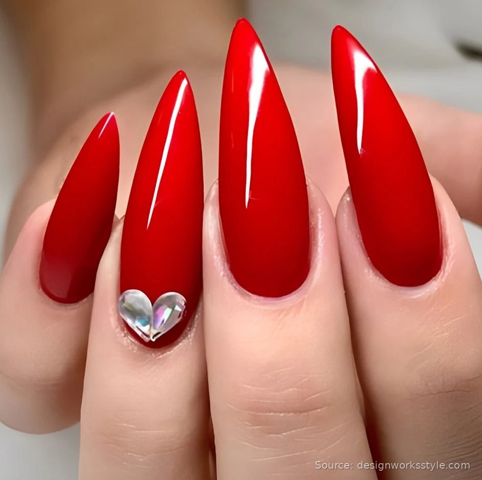 Glossy candy apple red fall nails on stiletto nails