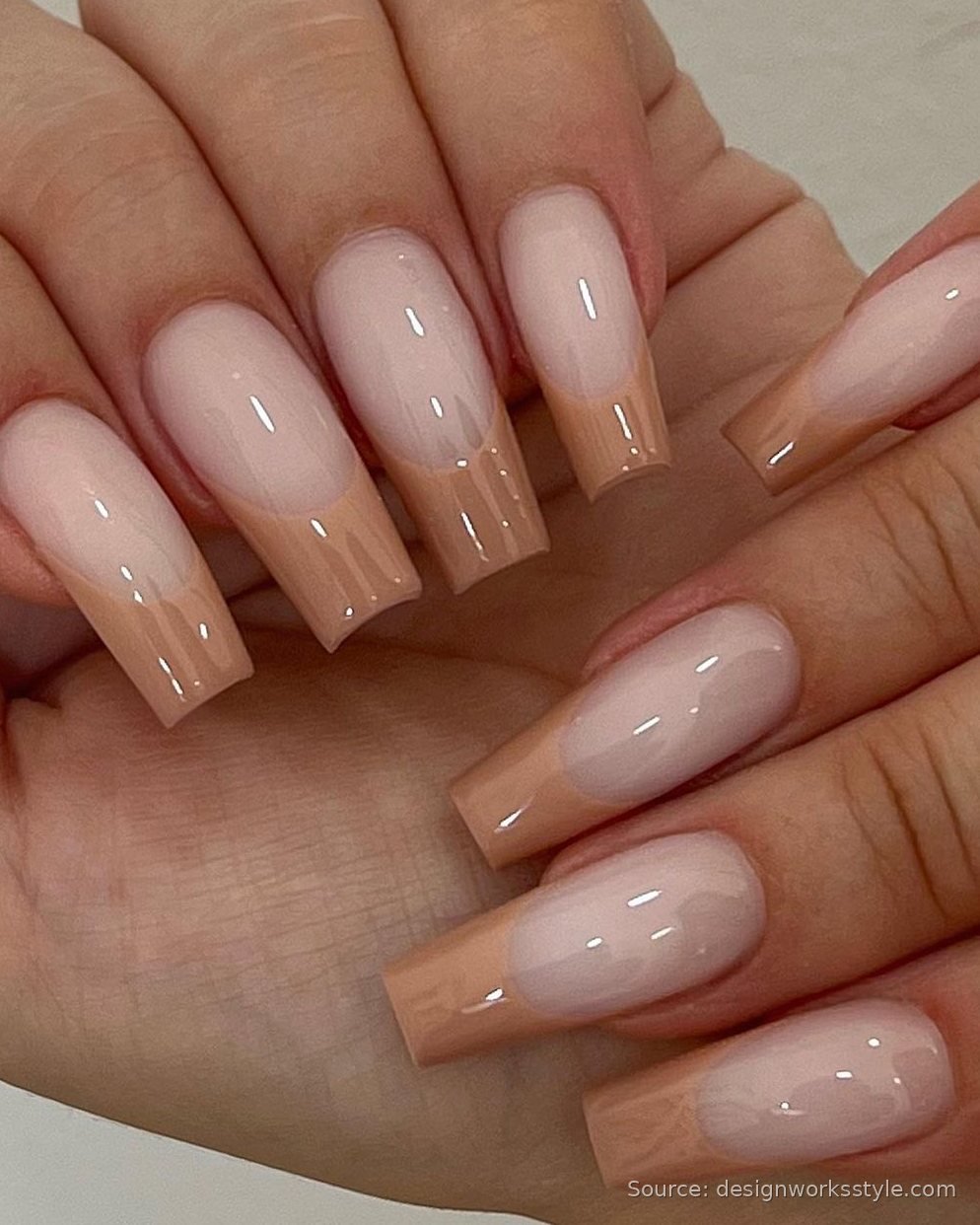 Caramel French tip coffin nails on nude base
