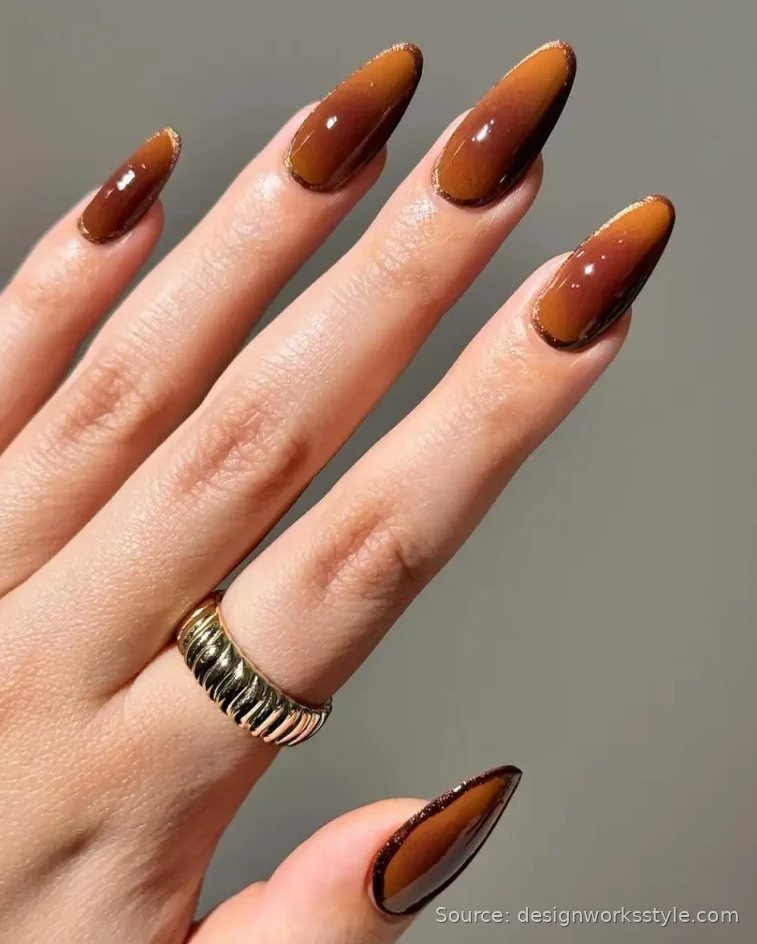 Caramel to brown ombre nails with gold shimmer outline