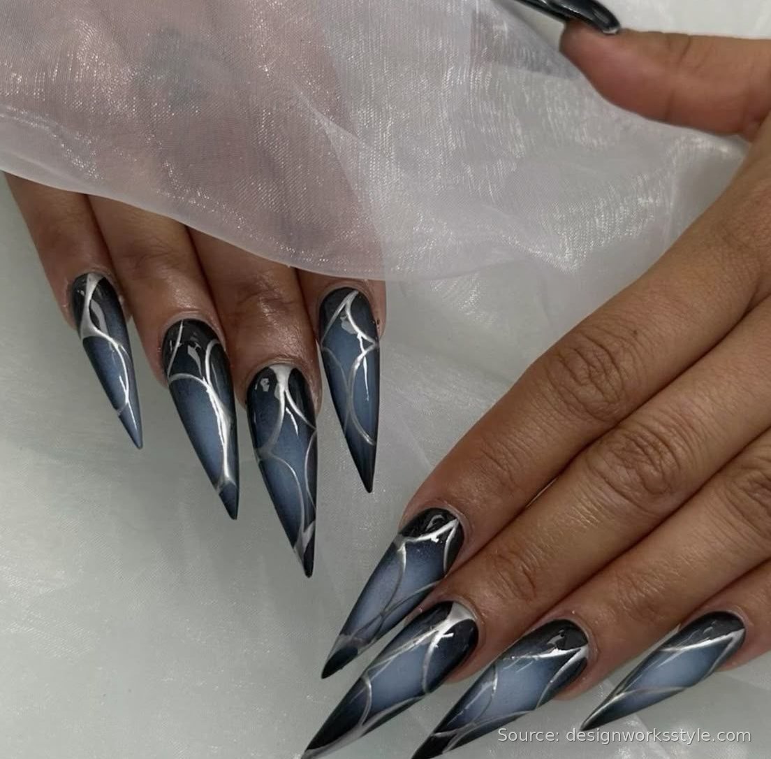 Charcoal stiletto nails with silver line art on dark winter nails