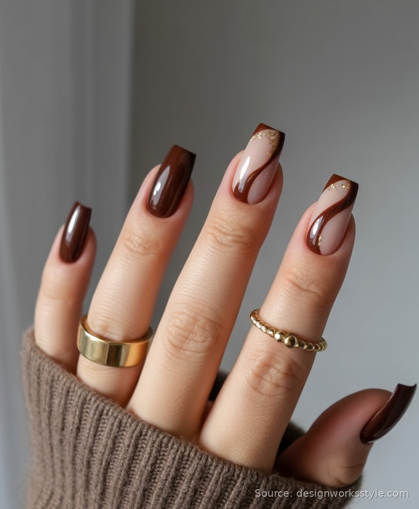 Chocolate brown nails with caramel swirl accent nails and gold rings