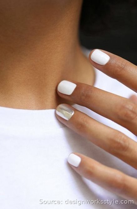 White manicure with a single silver chrome accent nail