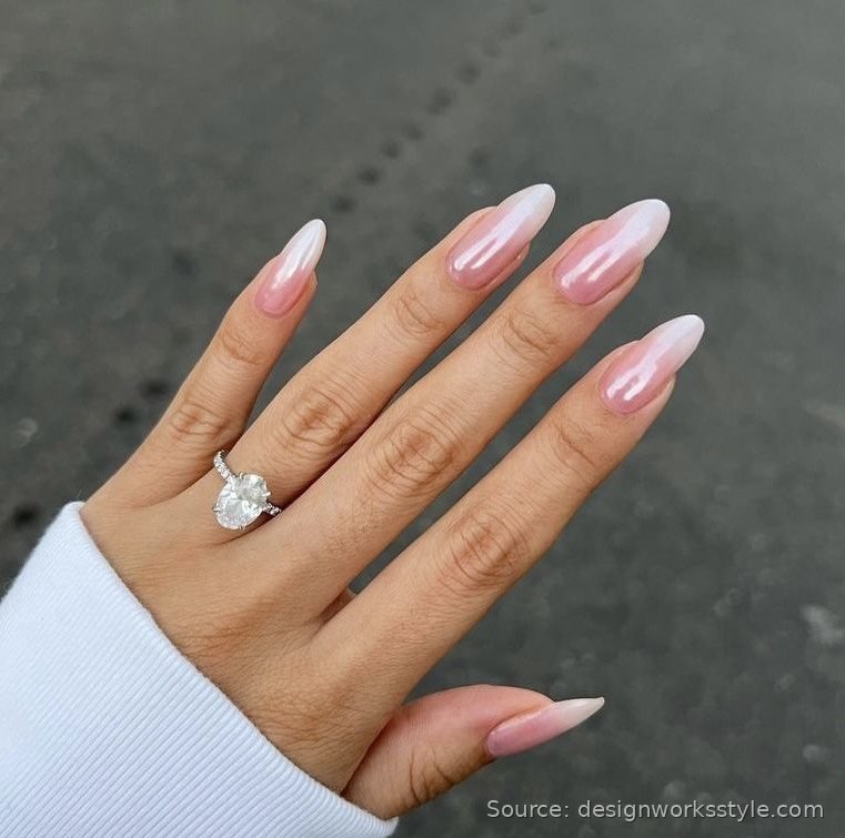 Chrome ombre nails fading from pink to white with a Hailey Bieber glaze