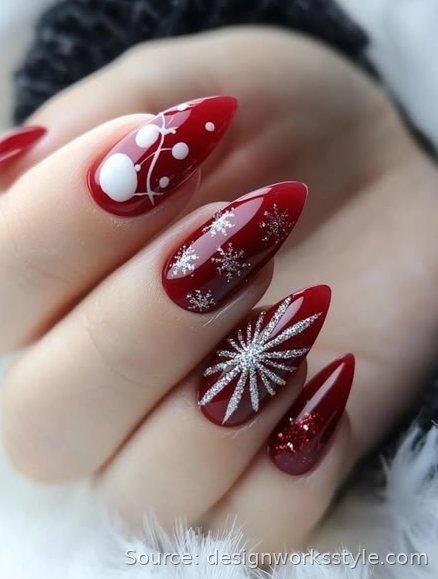 Classic Christmas red stiletto nails with white snow art and silver glitter snowflake