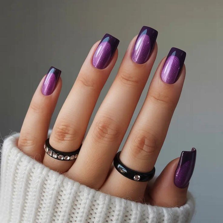 Dark plum purple nails with black French tips