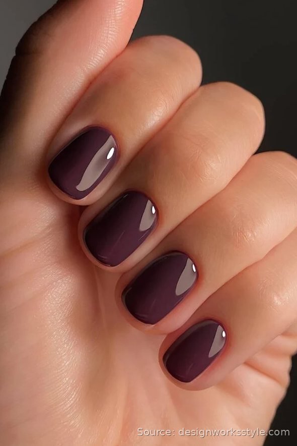 Glossy deep plum Thanksgiving nails on short oval nails