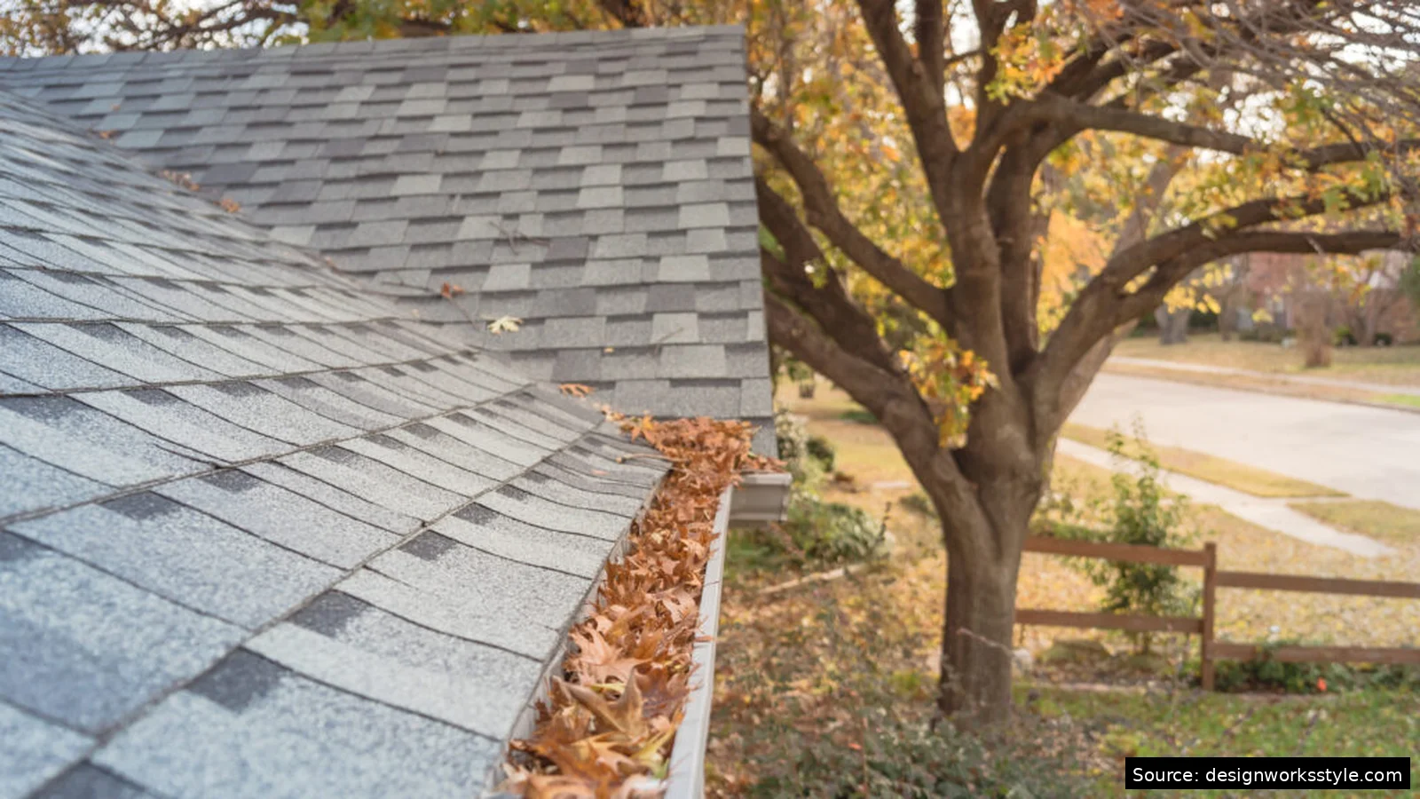 House exterior in autumn, time for gutter cleaning and fall home maintenance tasks