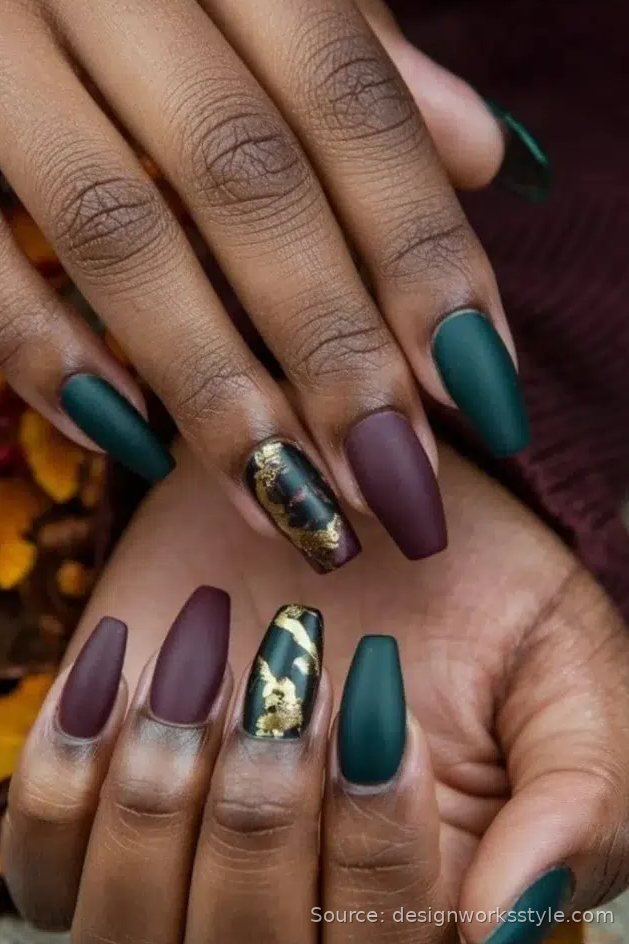 Matte forest green and plum coffin nails with gold foil accents